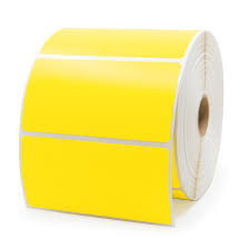 Yellow 63mm x 23mm thermal transfer label roll on a 25mm core, 1000 labels per roll