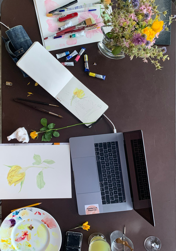 Painting materials, botanical subjects on a table outdoors