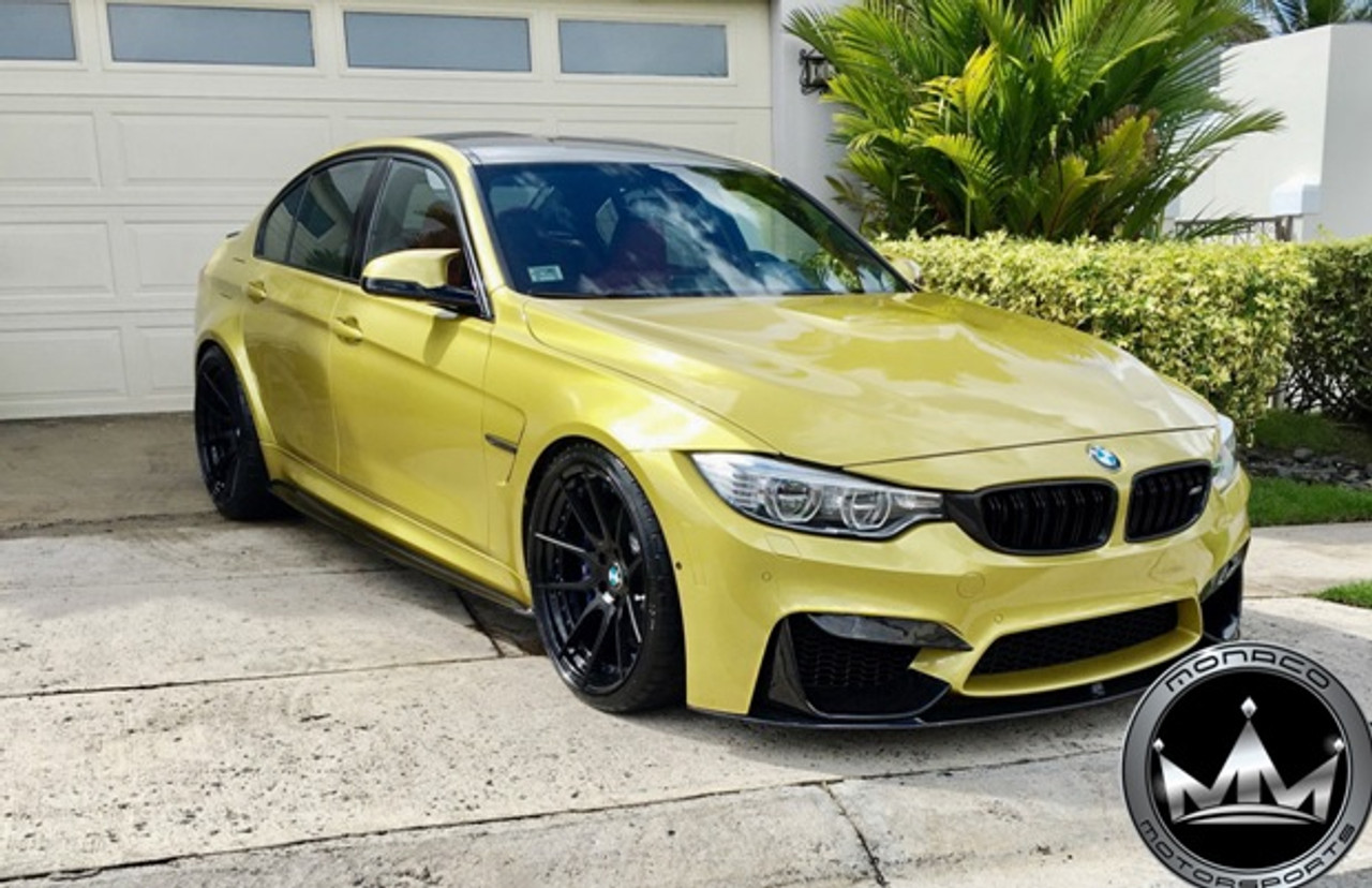 Yellow BMW M3 Parked in Driveway