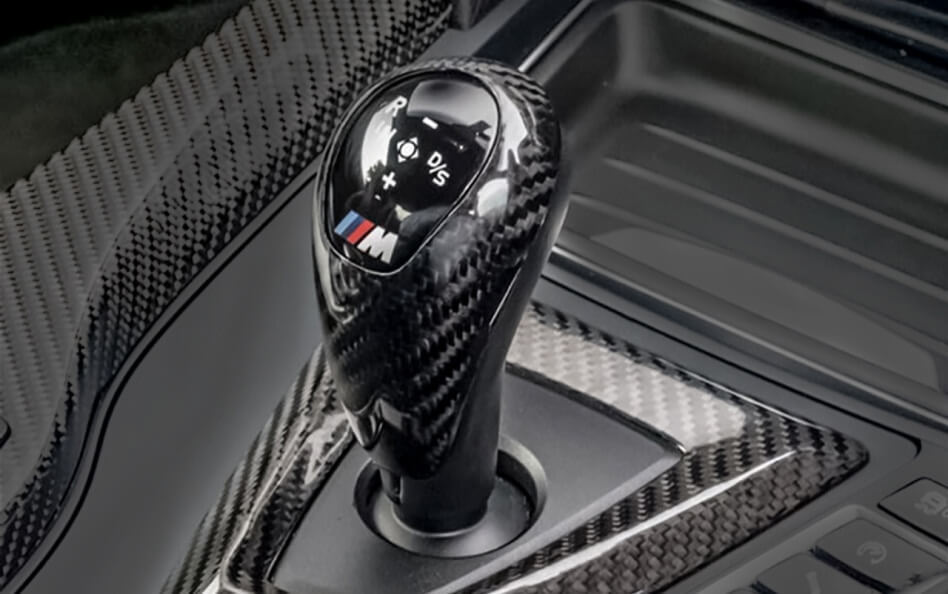 Carbon fiber gear shift knob in a BMW.