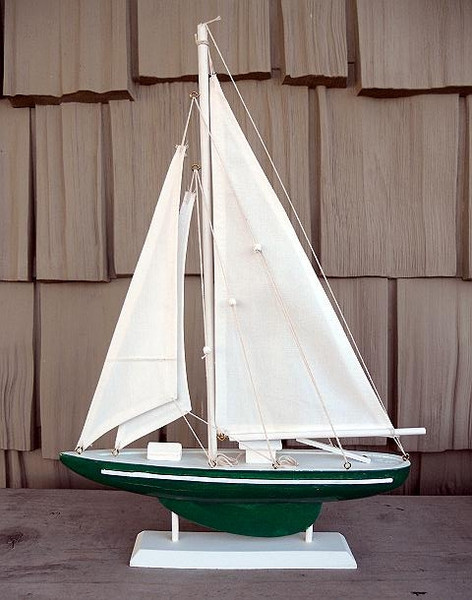 decorative wooden sailboat with fabric sails Nautical Seasons