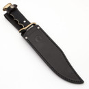 Spanish military-style combat/field knife with full tang clip point blade, jimped spine, black ABS handles with finger grooves