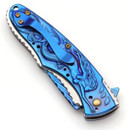 Underwater Wonderland Swimming Mermaid Folder has anodized blue coating on the blade, jimped liners, wave patterns on stainless steel blade