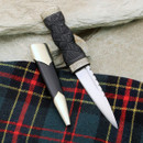 Windlass Sgian Dubh has black wood handle, embossed nickel silver fittings with thistle motif and includes leather scabbard