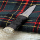 Windlass Sgian Dubh has sharp high carbon steel blade, black wood handle and embossed nickel silver fittings with thistle motif