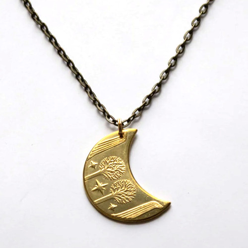 LOTR Golden Moon necklace shows Rivendall valley with waterfalls, ancient silver and gold trees, three Silmarils shown as stars