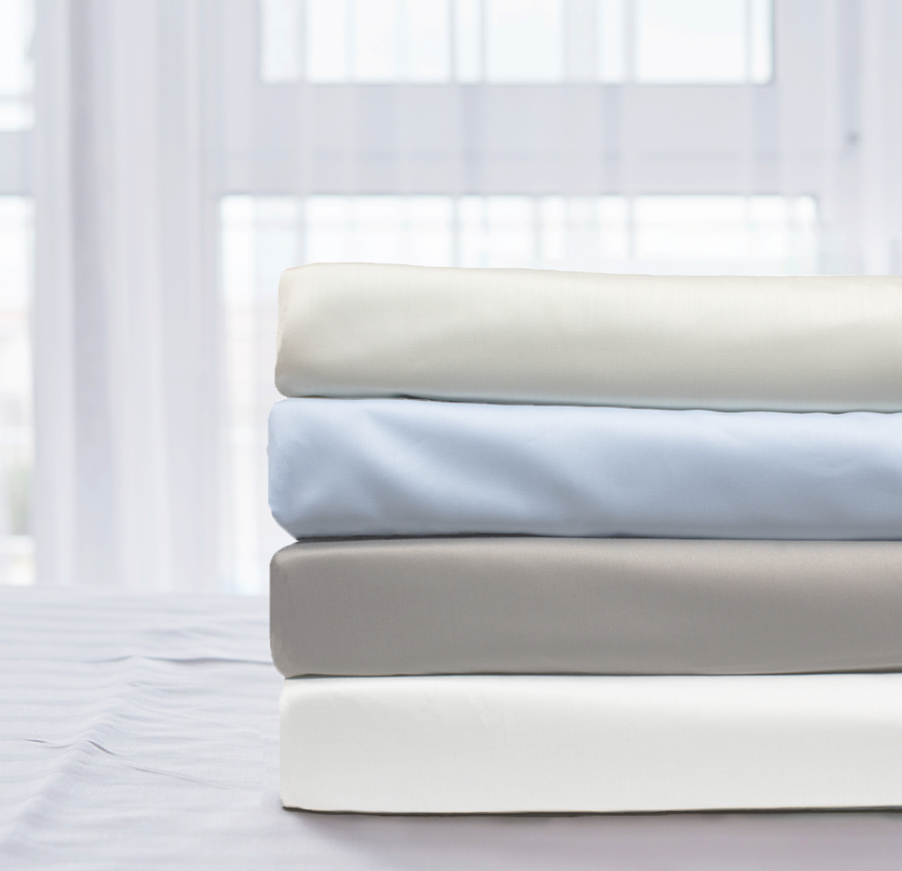Stack of American Traveler sheets in 4 colors