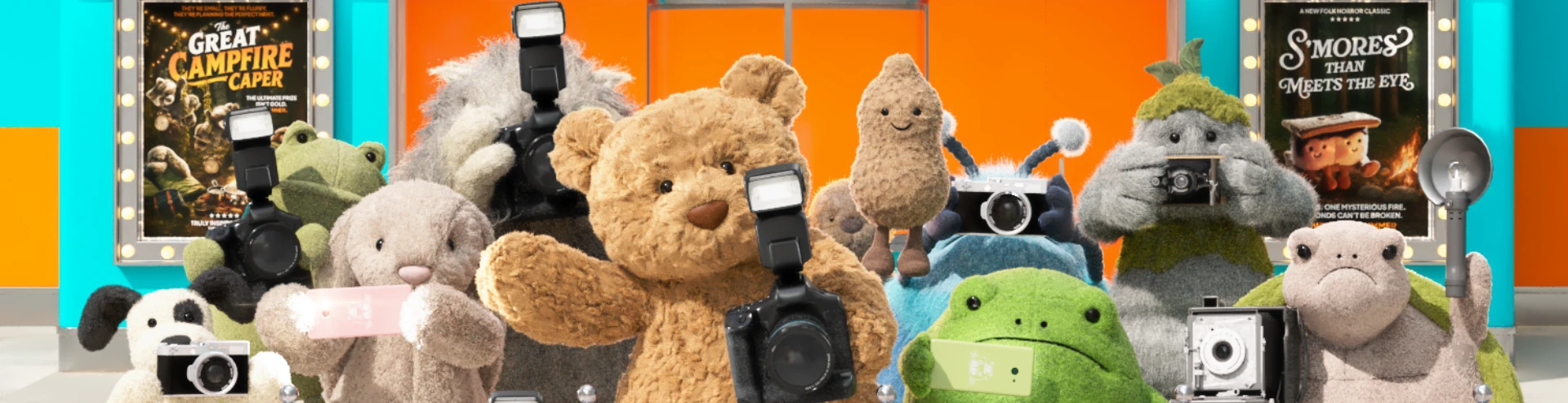 Jellycat characters gathered like photographers, holding cameras against a colorful exhibition-style backdrop
