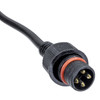 Close-up of a waterproof 4-pin connector attached to a black cable. The black circular connector features a threaded locking collar, red sealing O-ring, and four gold-colored contact pins designed for secure RGB LED lighting connections. Displayed on a white background.