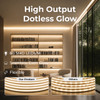 Warm White LED neon rope light illuminating a room. Comparison graphic shows uniform glow from ‘Our Product’ versus visible LED dots in ‘Others.’ Text notes 60 SMD LEDs per meter, seamless glow, and flexibility.