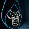 Side angle of glowing neon strip light LED sign depicting a hooded skull outlined in bright green and white neon strip light.