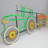 LED neon pumpkin tractor with colorful wheels and pumpkin-filled trailer, designed as a festive Halloween decoration.