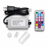Close-up of an RGB LED rope light controller kit laid out on a light gray background, including a black power cord with plug, a rectangular metal control box labeled “Synchronous RGB LED Controller” with technical specifications (input voltage AC110–120V, max load 60–120W, output current 0.5A max), a small inline connector, a 2‑pin adapter, a translucent end cap, and a handheld remote labeled “COLOR CHIP” with multicolored buttons for power, brightness, color selection, and lighting modes such as fade, flash, and strobe.