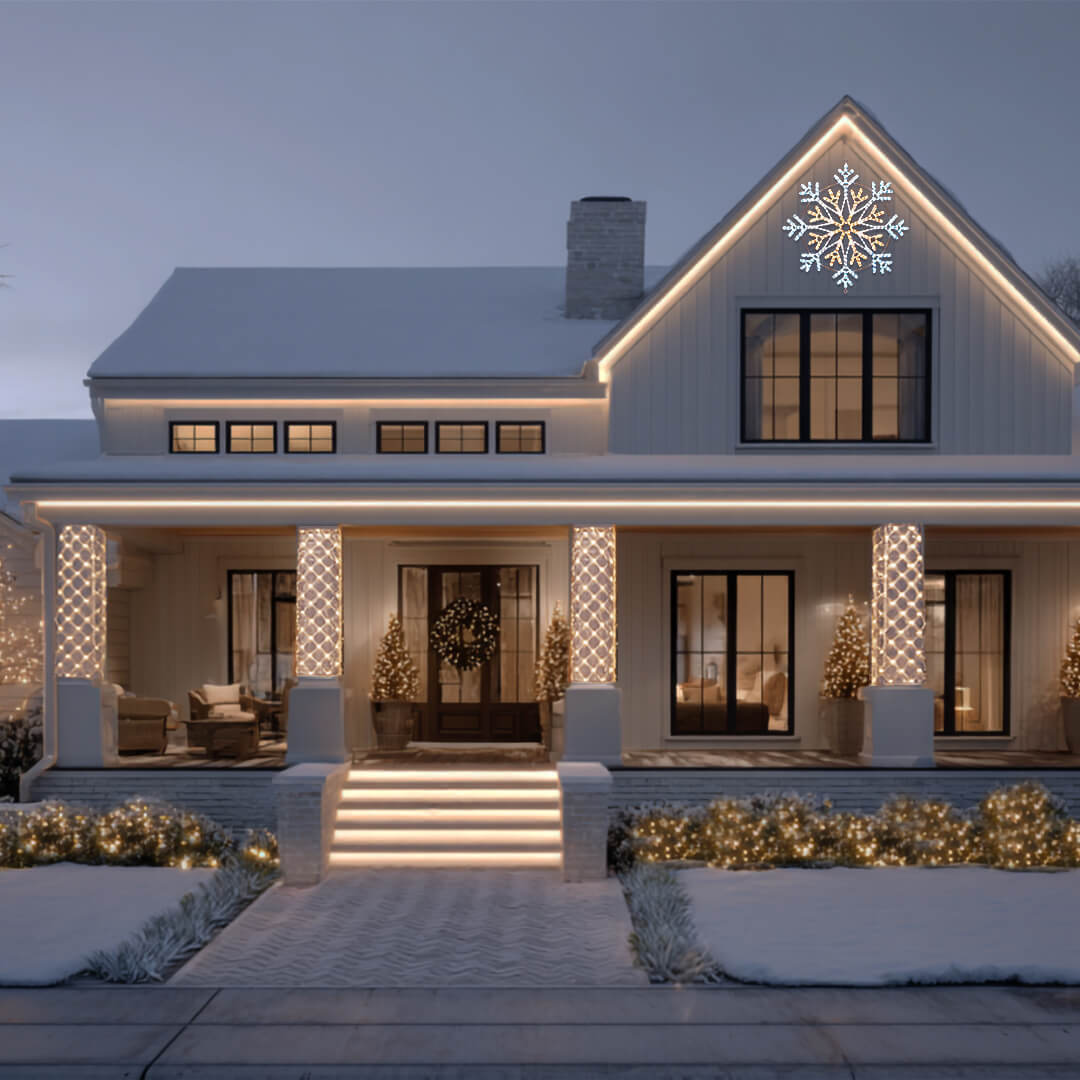 House with layered LED Christmas lights and net lights in bushes