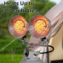 camping lifestyle image of double burner tank top heater turned on