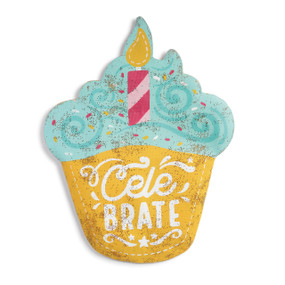 metal wall hanging painted and shaped like a cupcake with blue icing with Celebrate painted in center in white