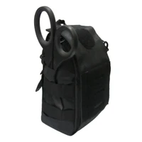 a side view of a black tactical medical pouch showing a pair of black shears