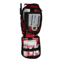 Open First Responder Kit showing organized medical supply pockets with trauma dressings and burn treatment