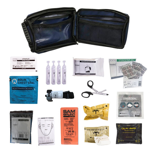 DS Medical trauma kit contents laid out: dressings, tourniquet, shears, and gloves