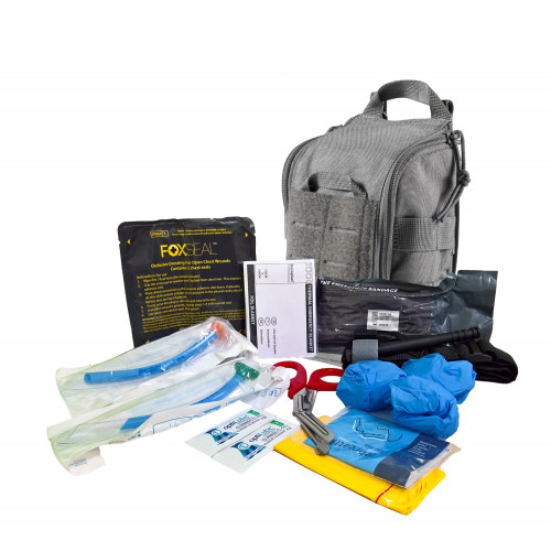 DS Medical Immediate Response IFAK trauma first aid kit with tourniquet, chest seal, hemostatic gauze and tactical pouch contents layed out DS Medical Immediate Response IFAK trauma first aid kit with tourniquet, chest seal, hemostatic gauze and tactical pouch contents layed out