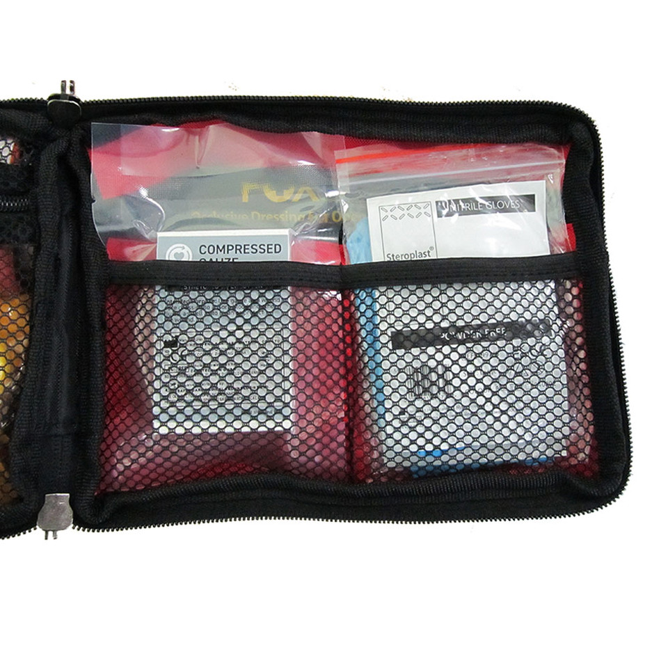 Bleed Control Kit open pouch side angle with tourniquet, chest seal, and dressings visible