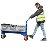 Cash and Carry Stacking Trolley carrying three boxes with an operator