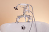 P1054 Deck Mount Faucet w/ Handheld Shower