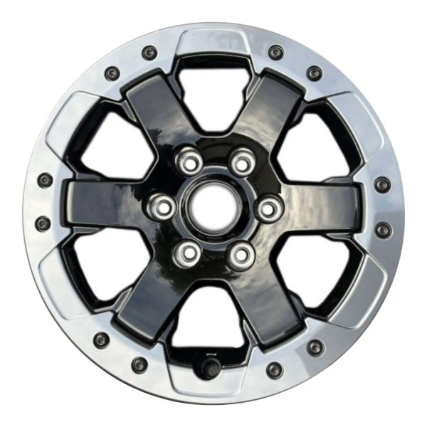 17-inch Black Ford Bronco oem rim 10386 with beadlock front view on white background.