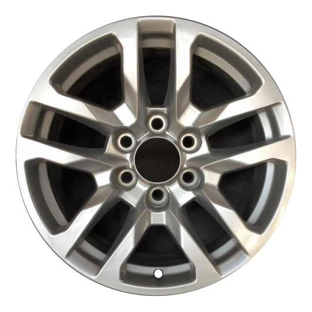 18-inch Silver Chevy Silverado oem rim 5912 front view on white background.