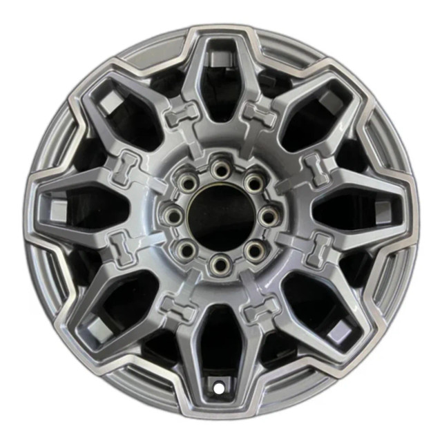 22-inch Charcoal Hummer EV oem rim 14094 front view on white background.