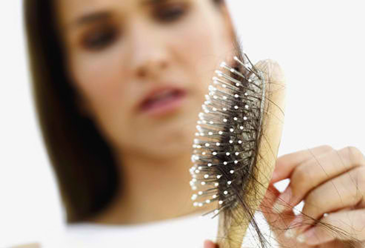 NATURALLY STOP WOMANS HAIR LOSS