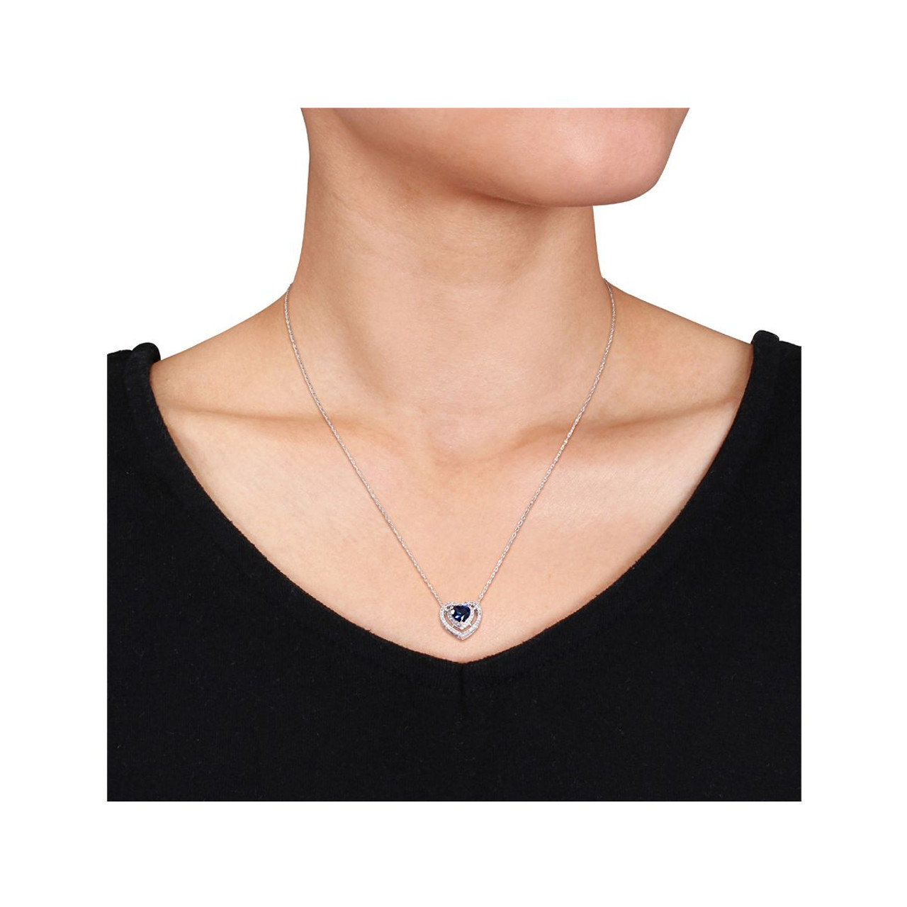 4/5 Carat (ctw) Lab-Created Blue Sapphire Halo Heart Pendant Necklace product image 4/5 Carat (ctw) Lab-Created Blue Sapphire Halo Heart Pendant Necklace product image