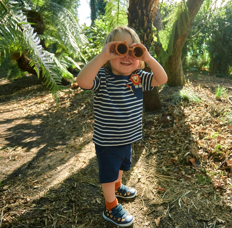 Boy with binoculars