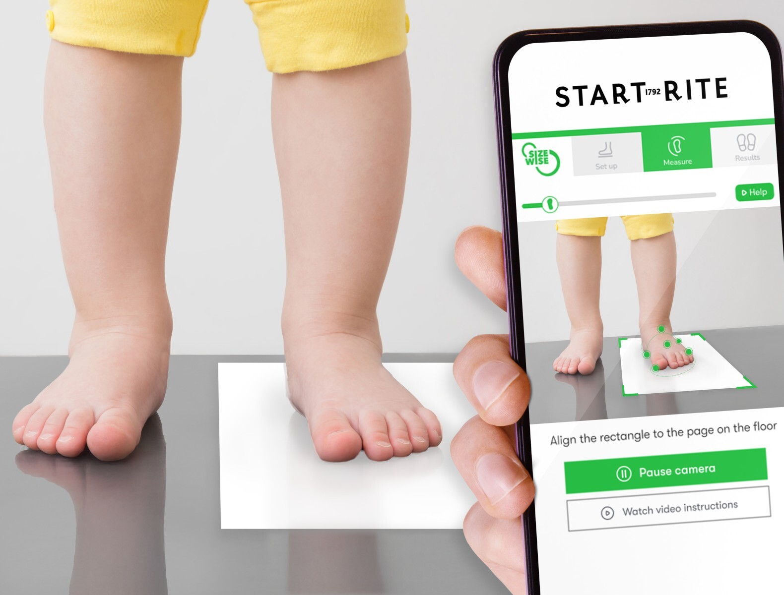 Mobile phone being used to scan child's foot for their Start-Rite shoe size