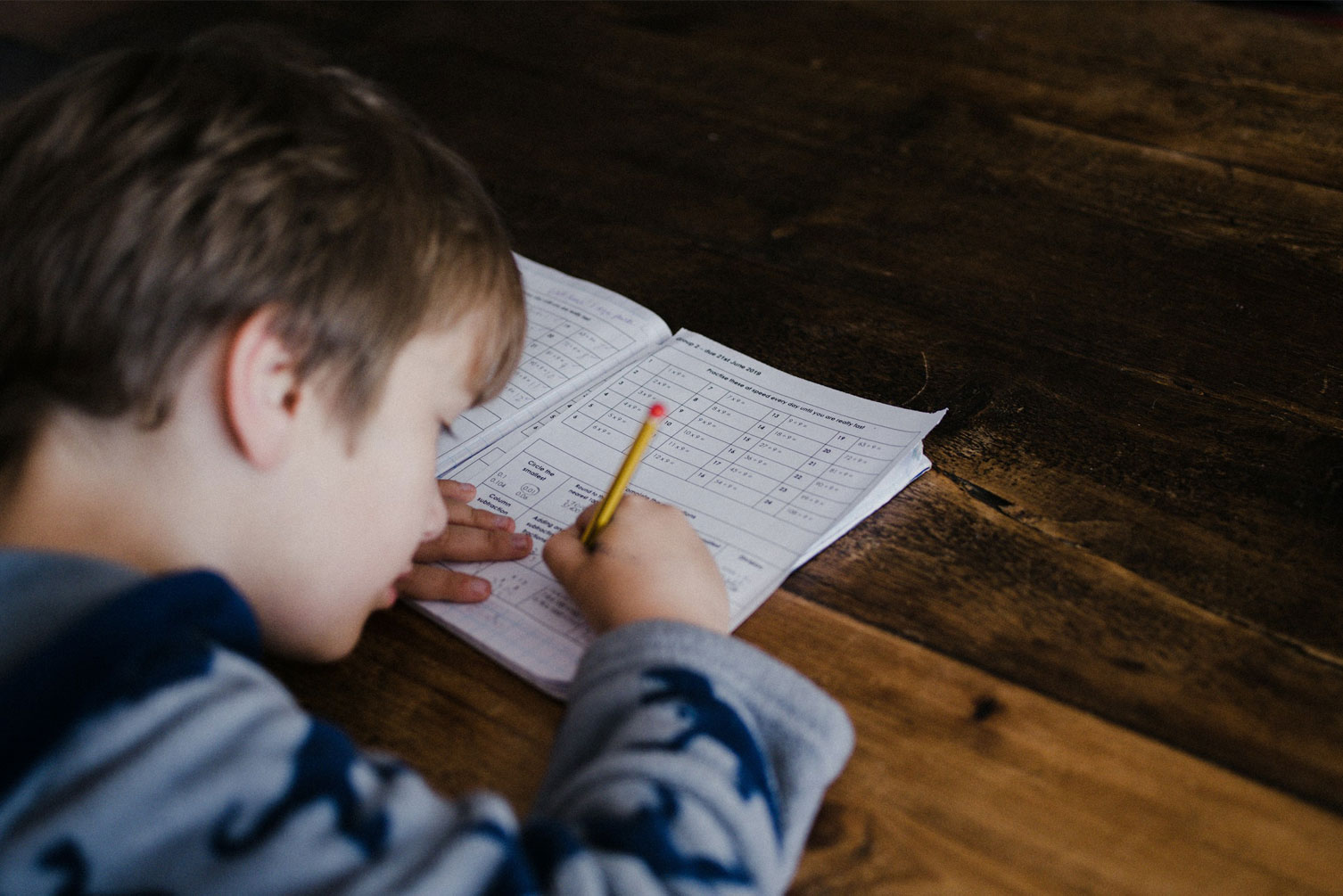 Boy studying during homeschooling Boy studying during homeschooling