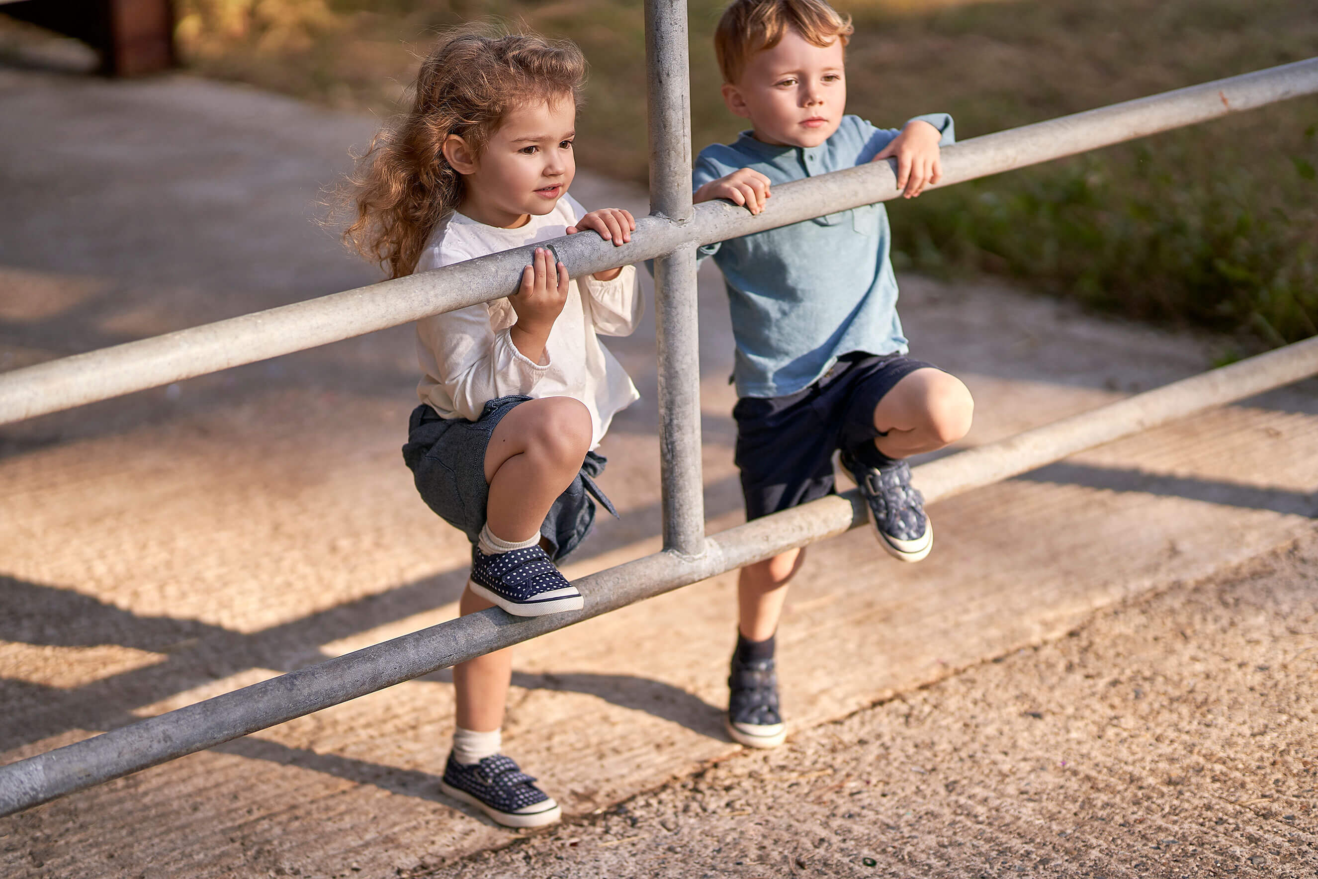 Girl and boy wearing canvas shoes