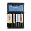 Four-slot smart charger holding various button top batteries displays independent charging status via LED indicators.