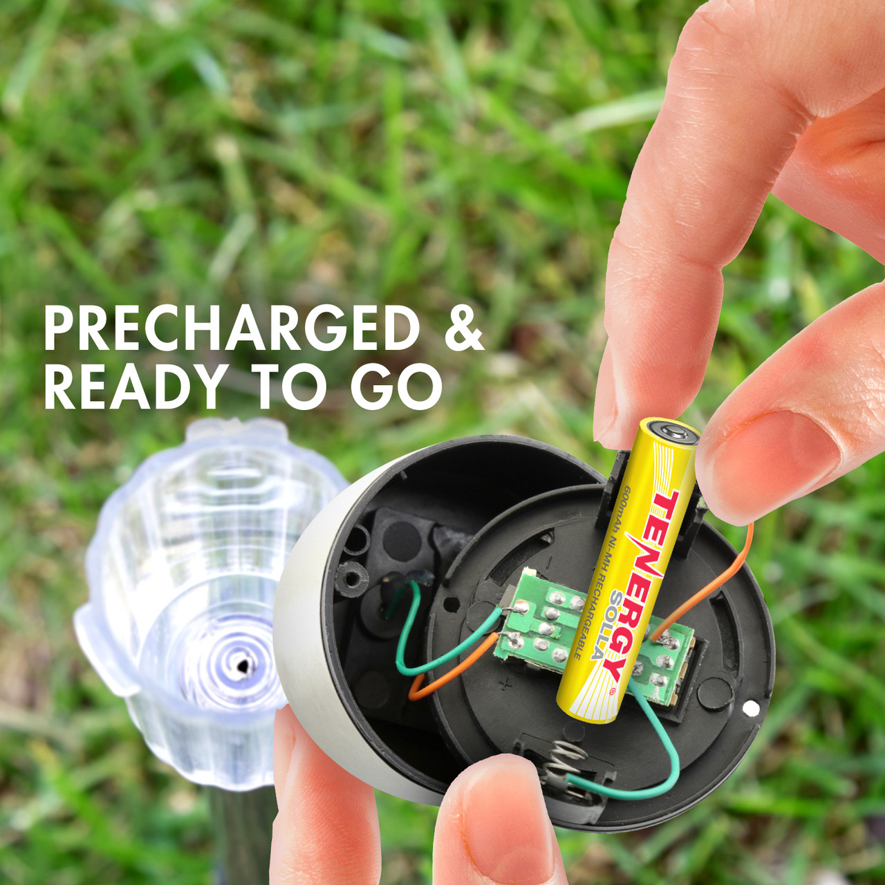 Precharged AAA rechargeable battery being installed into a fixture for instant use in energy-efficient solar lawn decorations.