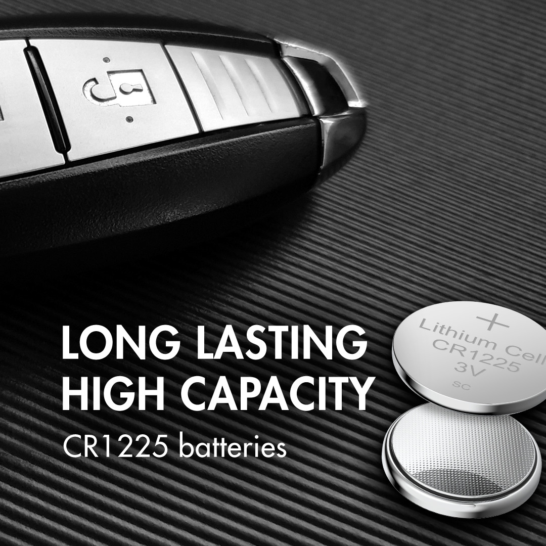 High capacity CR1225 coin cells placed next to a car key fob for wireless remote replacement.
