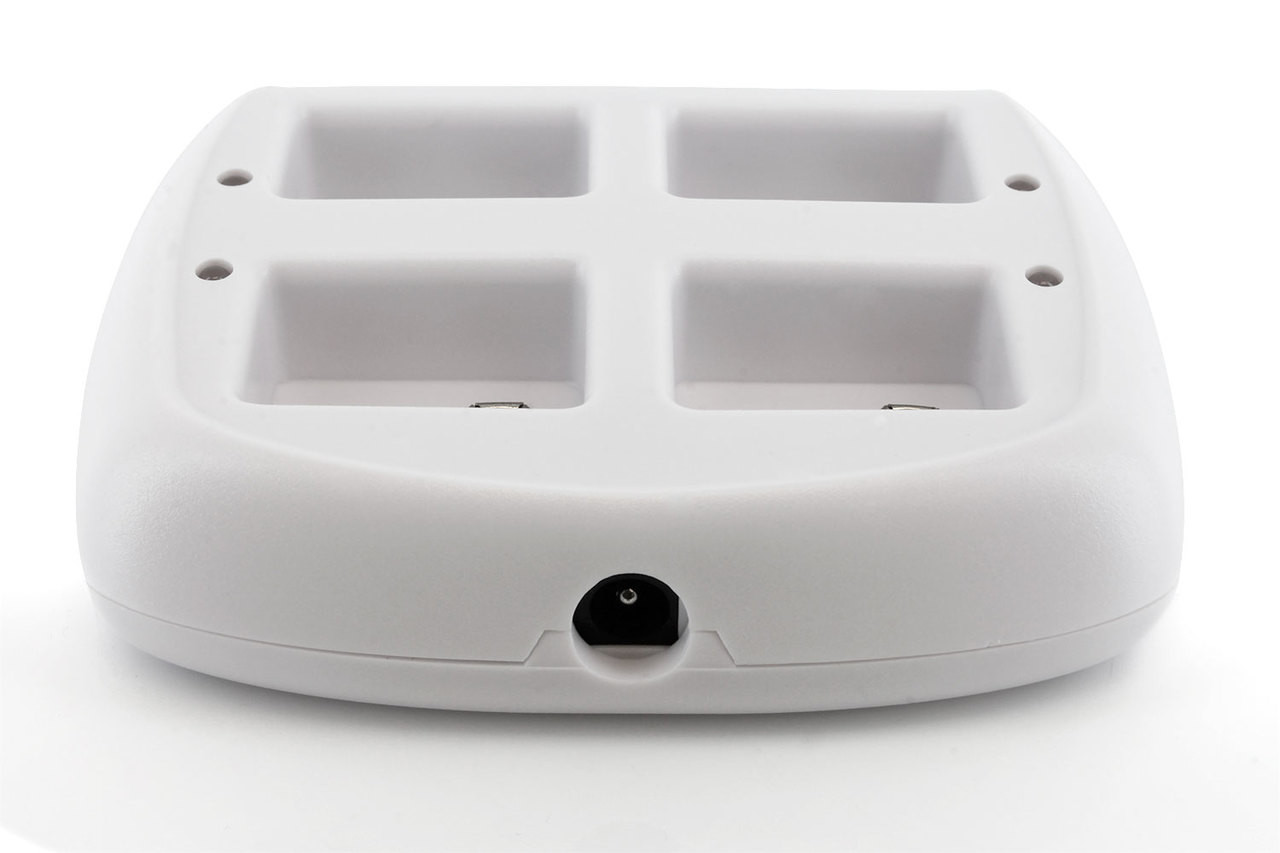 The rear DC input port of this portable power charger allows for easy connection to the included wall plug.