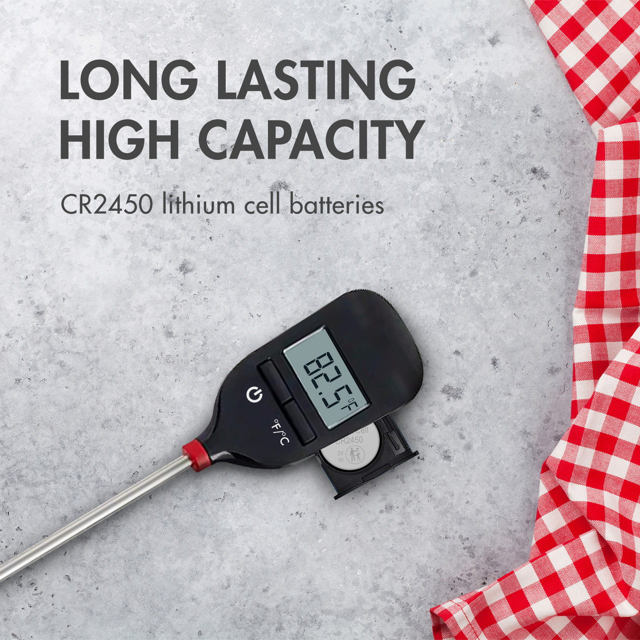High capacity CR2450 lithium cell battery powering a digital meat thermometer for kitchen use.
