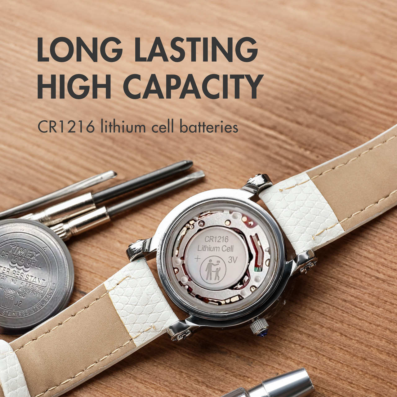 High capacity CR1216 lithium cell batteries being installed into a Timex wrist watch.