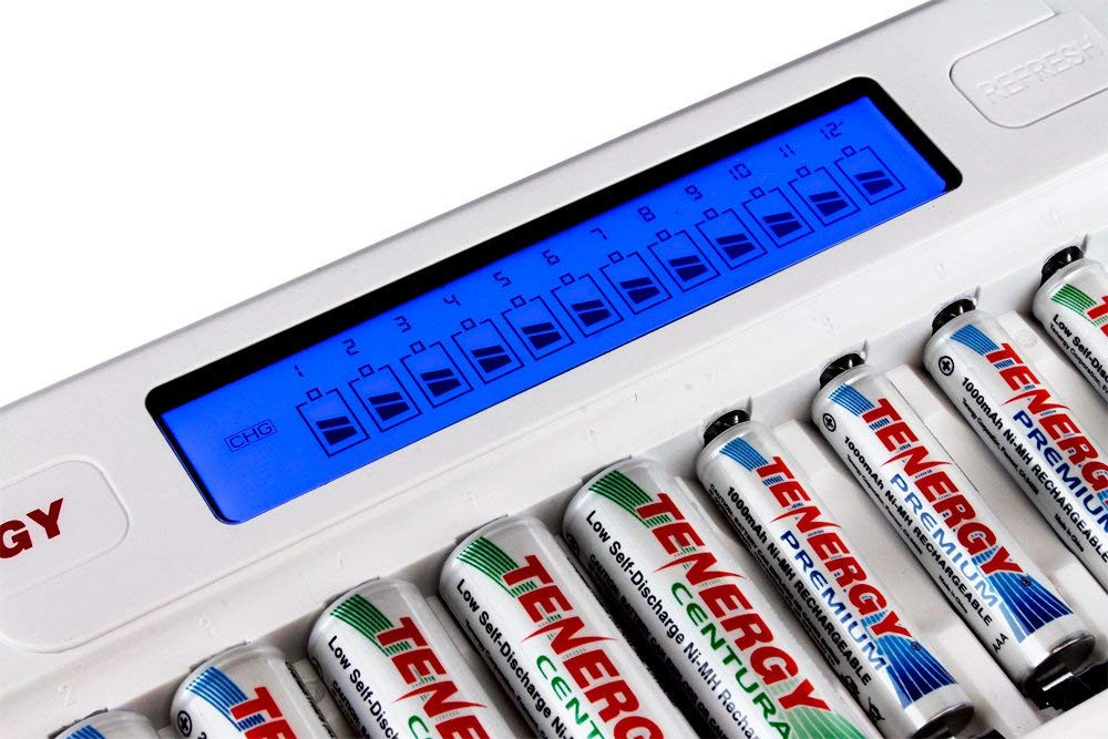 Illuminated blue LCD screen displaying the real-time charging status of individual NiMH rechargeable batteries.