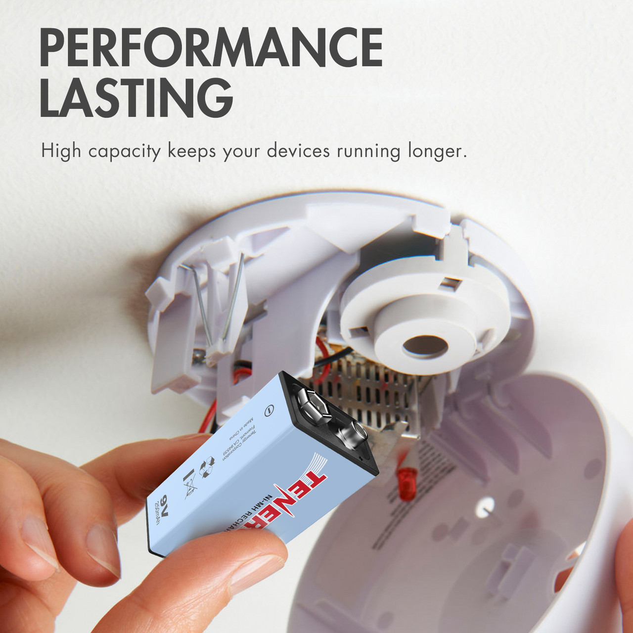 Tenergy 9V rechargeable battery being installed into a smoke detector to provide high capacity power for home safety devices.