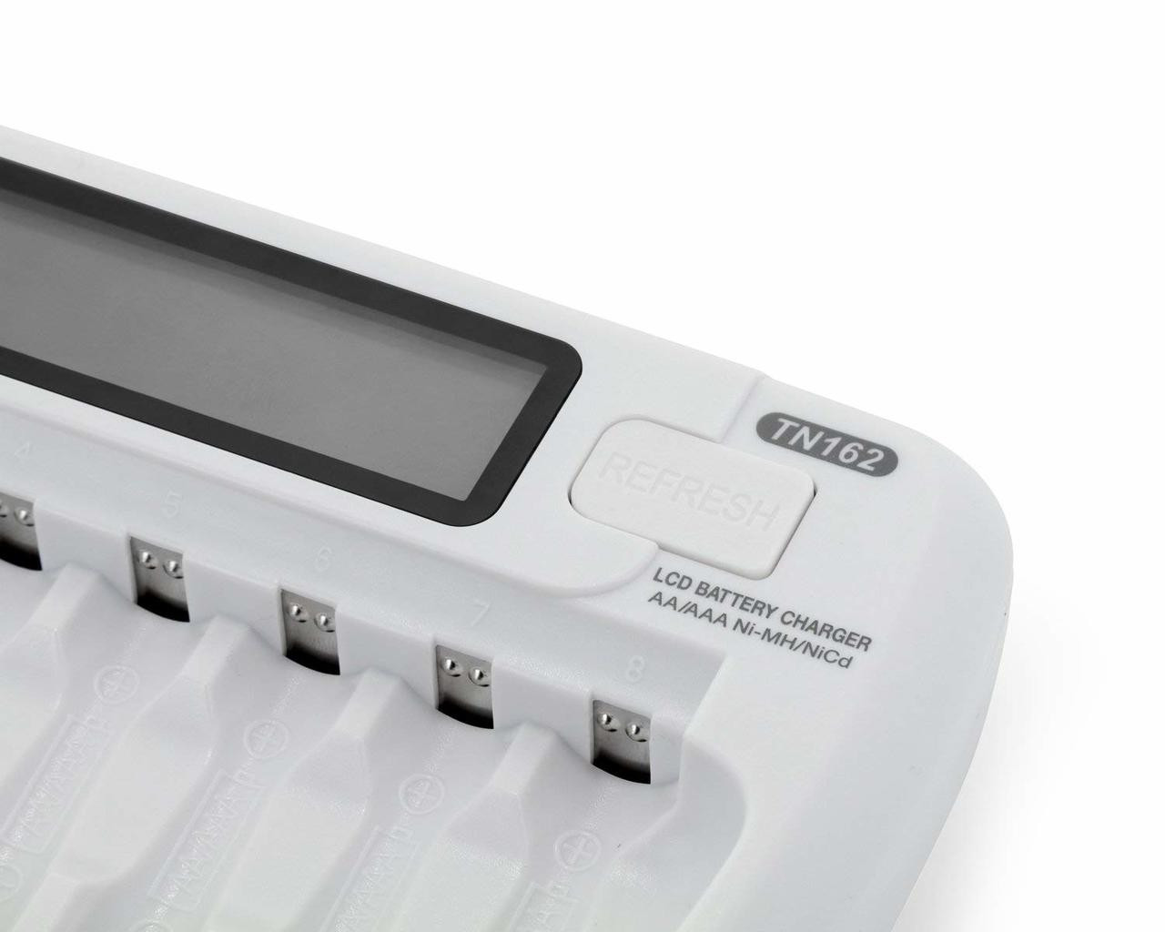 Close-up of the LCD battery charger refresh button designed to revive older NiMH rechargeable batteries.