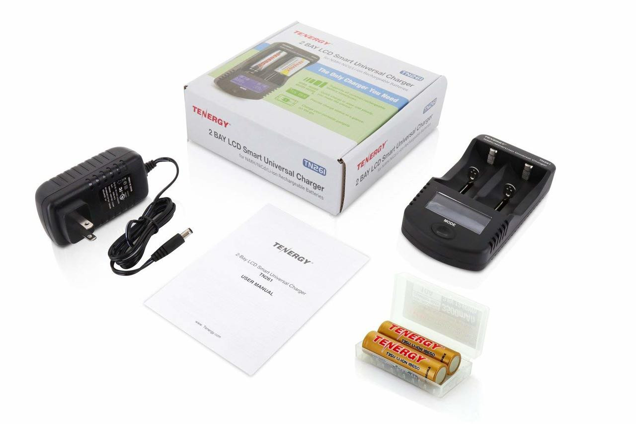 Complete TN261 charging set with power adapter, manual, and batteries for out-of-the-box use.