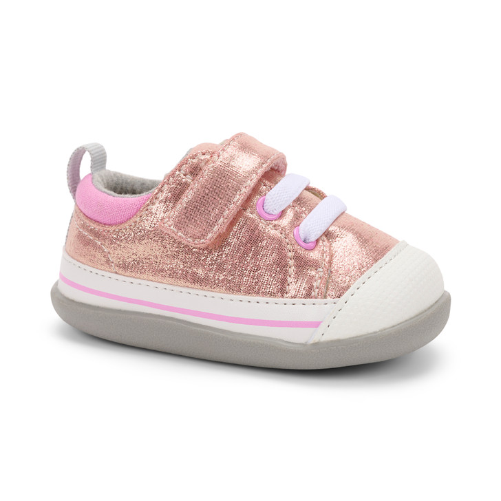 Side Angle for a Rose Shimmer First Walker Sneaker