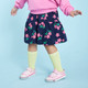 Photo of a girl in the Kristin Hot Pink/Stars sneakers