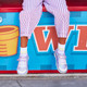 Lifestyle photo of child wearing the Kristin Purple Metallic