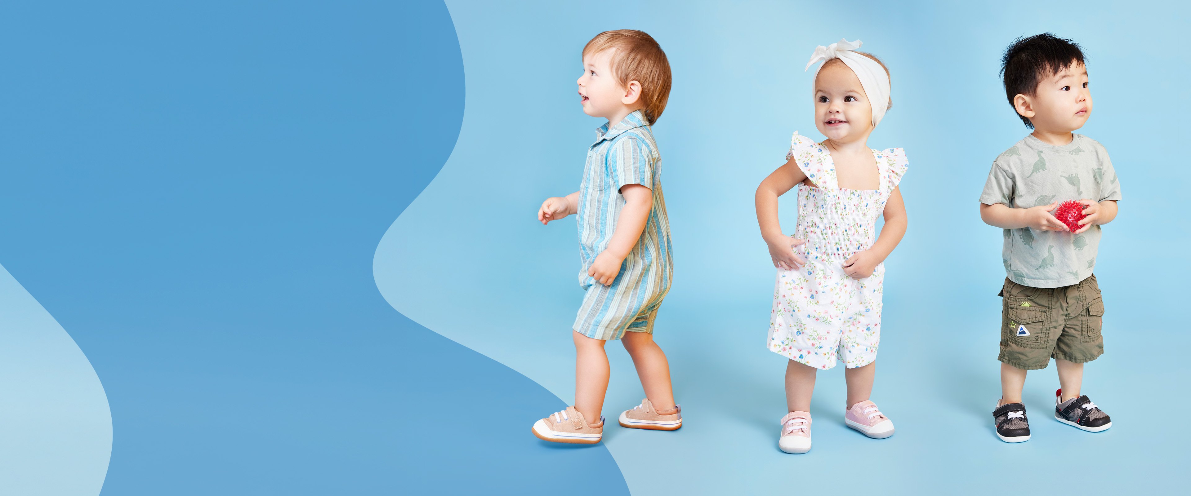 Two boy and one girl toddlers wearing First Walker styles from the Fall/Winter 2025 Collection.